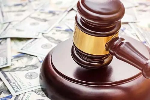 judges' gavel and money