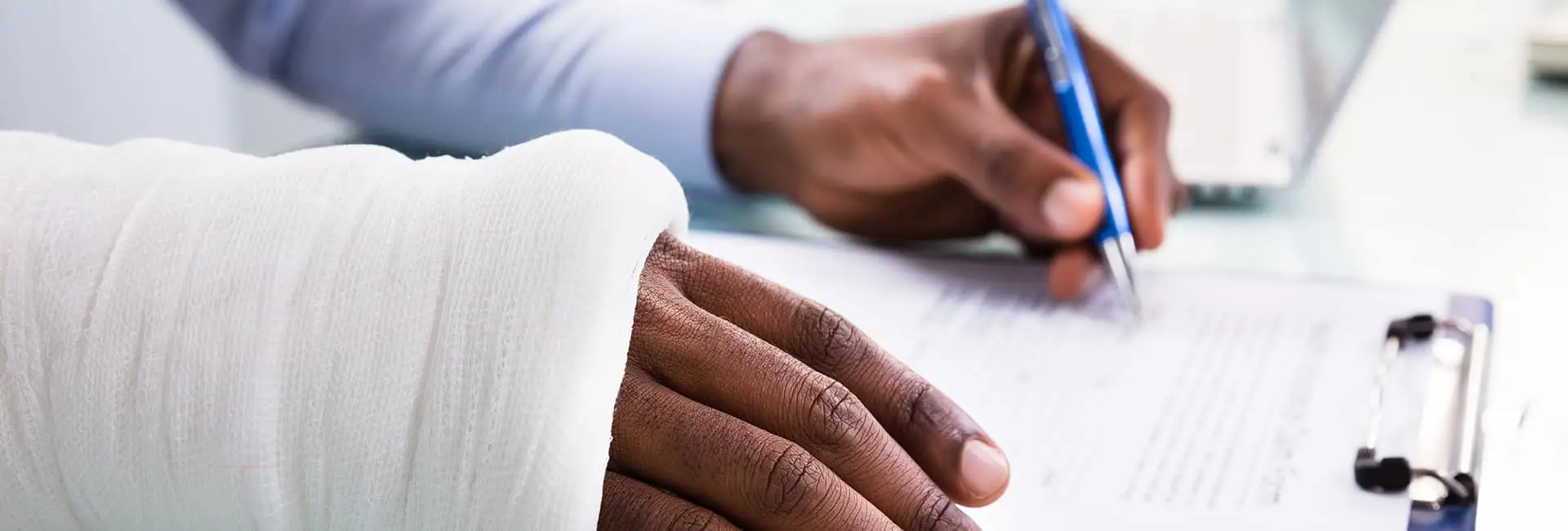 injured person with a cast on their hand