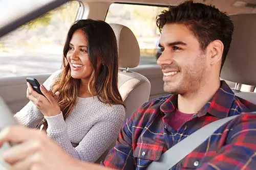 couple driving in a car